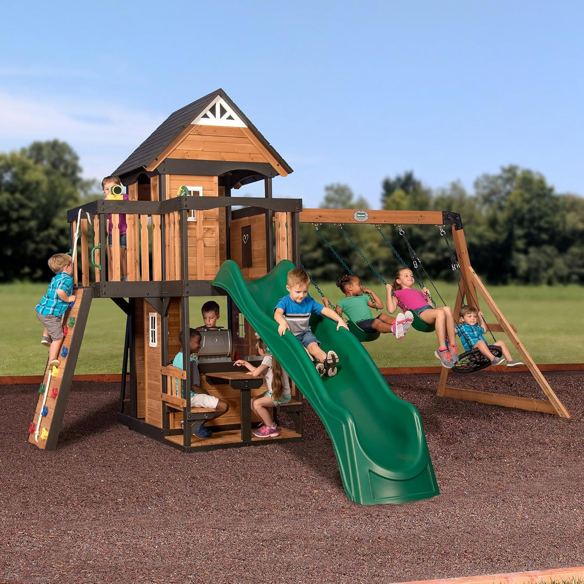 Backyard Discovery Canyon Creek Cedar Wood Swing Set with Wave Slide. Clubhouse. Play Kitchen. Picnic Area. Belt Swings. Web Swing. Rock Wall. Balconies. Playhouse. Step Ladder. Outdoor Playset - White