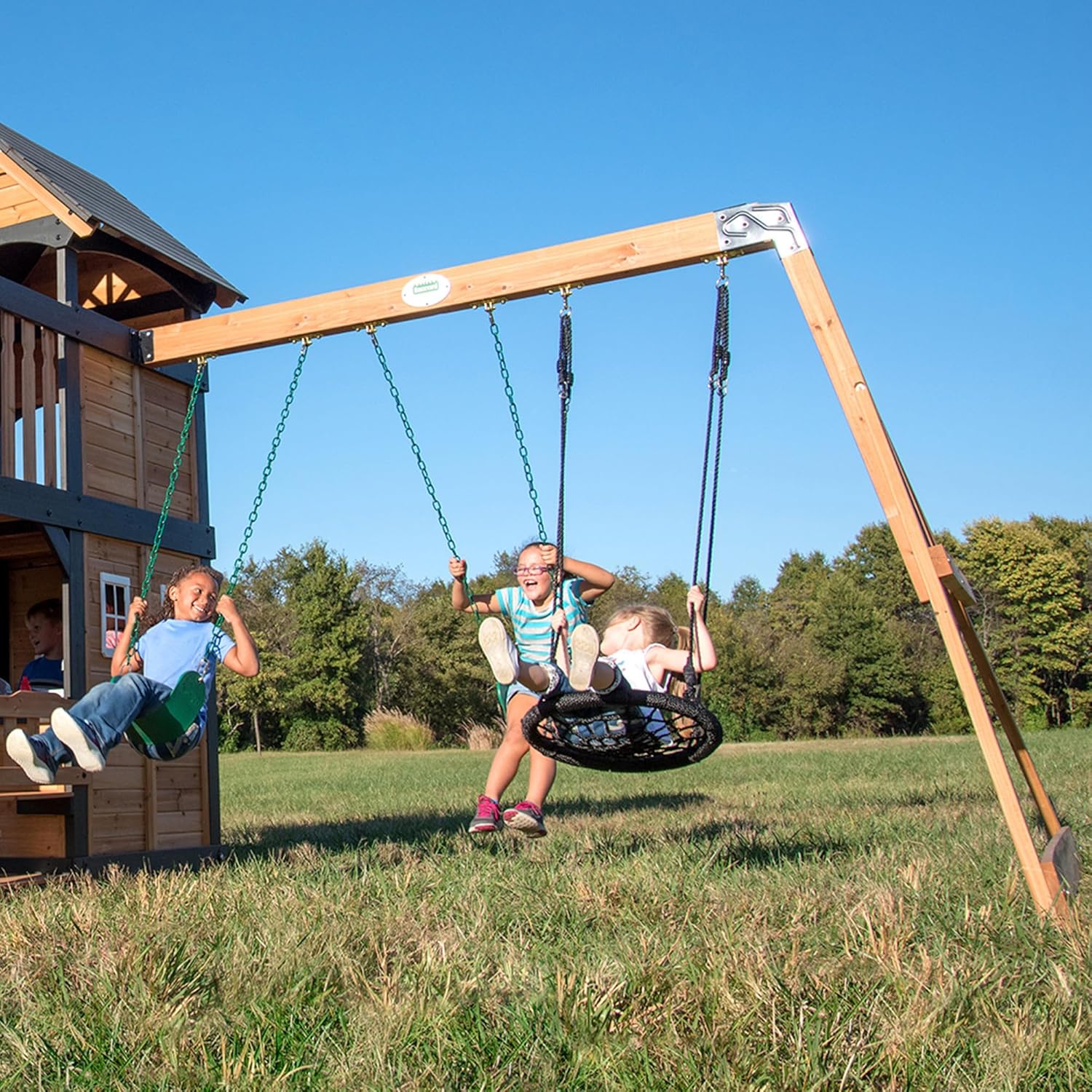 Backyard Discovery Canyon Creek Cedar Wood Swing Set with Wave Slide. Clubhouse. Play Kitchen. Picnic Area. Belt Swings. Web Swing. Rock Wall. Balconies. Playhouse. Step Ladder. Outdoor Playset